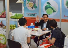 Mr Phan Vu Hoang from FRESHFRUITis receiving visitors at the booth. The company supplies a wide variety of fresh fruits from Vietnam, including mangos, dragon fruits, passion fruits and coconuts.